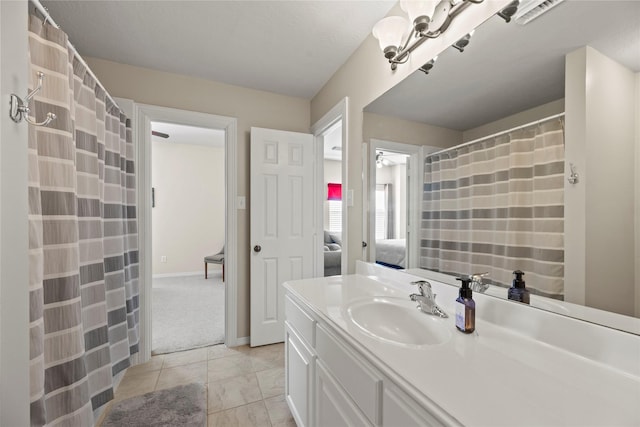17714 W Copper Lakes Dr, Houston, TX 77095 - ensuite bathroom with vanity, baseboards, and connected bathroom
