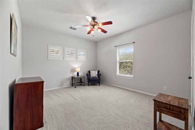 17714 W Copper Lakes Dr, Houston, TX 77095 - living area featuring a ceiling fan, baseboards, visible vents, and carpet