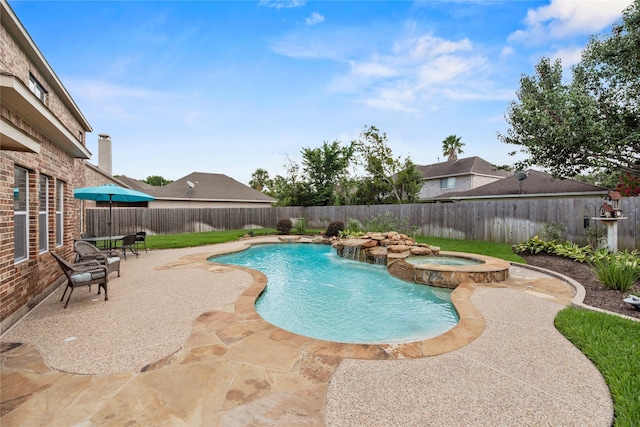 17714 W Copper Lakes Dr, Houston, TX 77095 - view of pool with a fenced backyard, a patio area, and a pool with connected hot tub