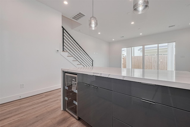 kitchen featuring recessed lighting, visible vents, modern cabinets, and light wood finished floors