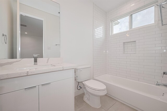 bathroom with visible vents, tile patterned flooring, vanity, toilet, and  shower combination