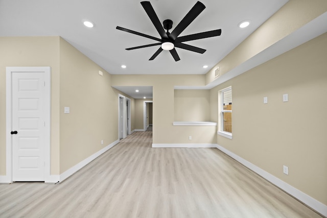unfurnished living room featuring ceiling fan, light wood finished floors, recessed lighting, baseboards, and visible vents