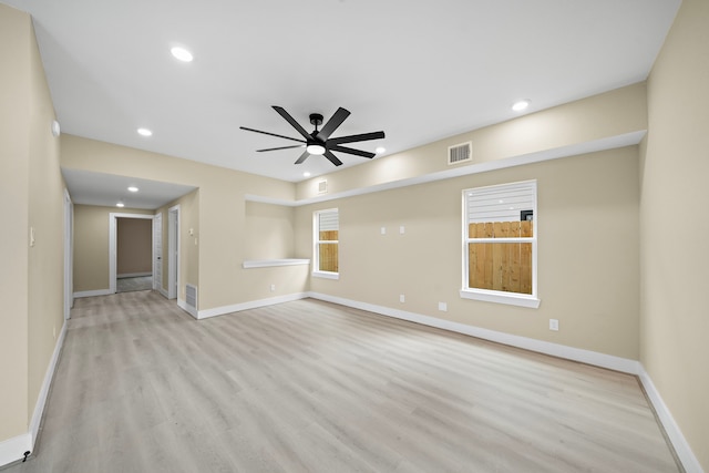 unfurnished living room with ceiling fan, recessed lighting, baseboards, wood finished floors, and visible vents