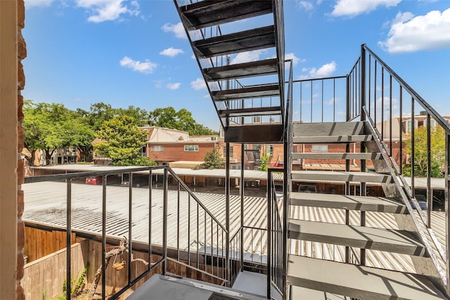 386 N Post Oak Ln, Houston, TX 77024 - view of patio / terrace with stairway and a balcony