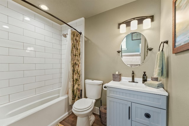 full bath with vanity, shower / bathtub combination with curtain, toilet, and wood finished floors