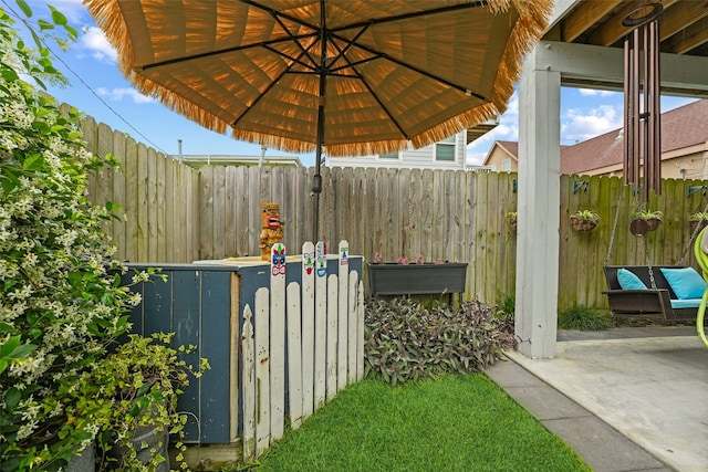 view of patio with fence