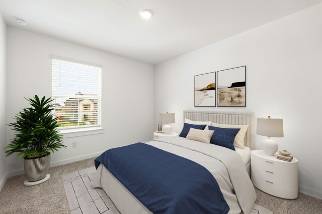 2811 Gran Castillo Dr, Texas City, TX 77568 - bedroom featuring baseboards and light colored carpet