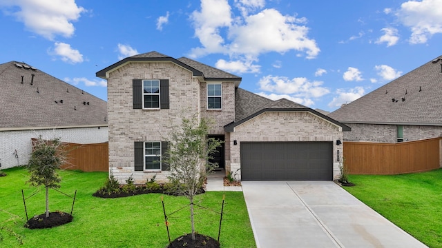 2811 Gran Castillo Dr, Texas City, TX 77568 - view of front facade with brick siding, an attached garage, driveway, and a shingled roof
