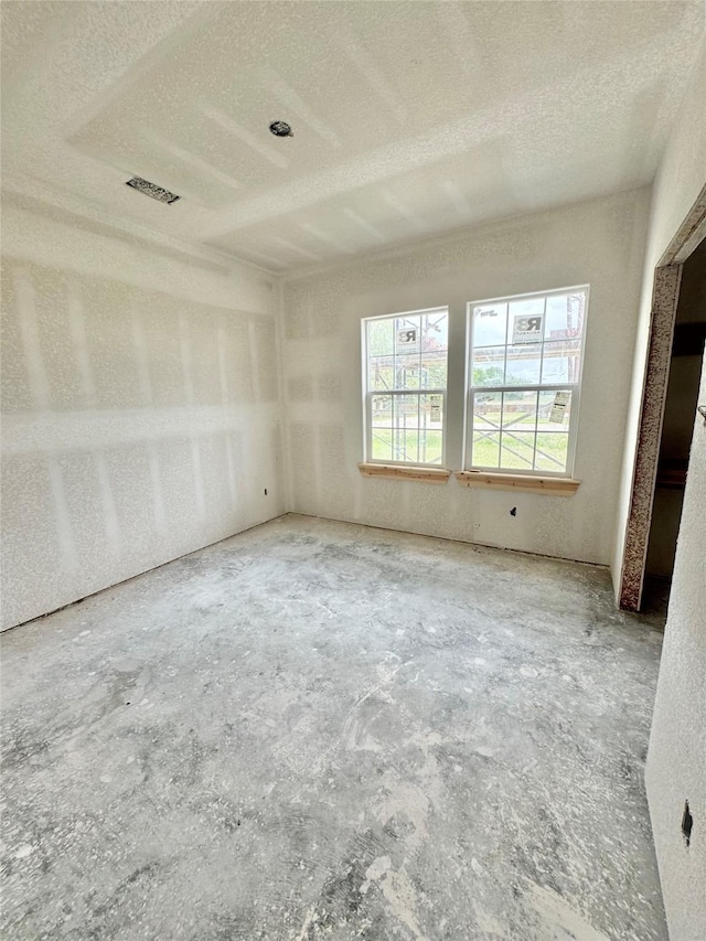 119 N 8th St, Beasley, TX 77417 - unfurnished room with a textured ceiling and visible vents