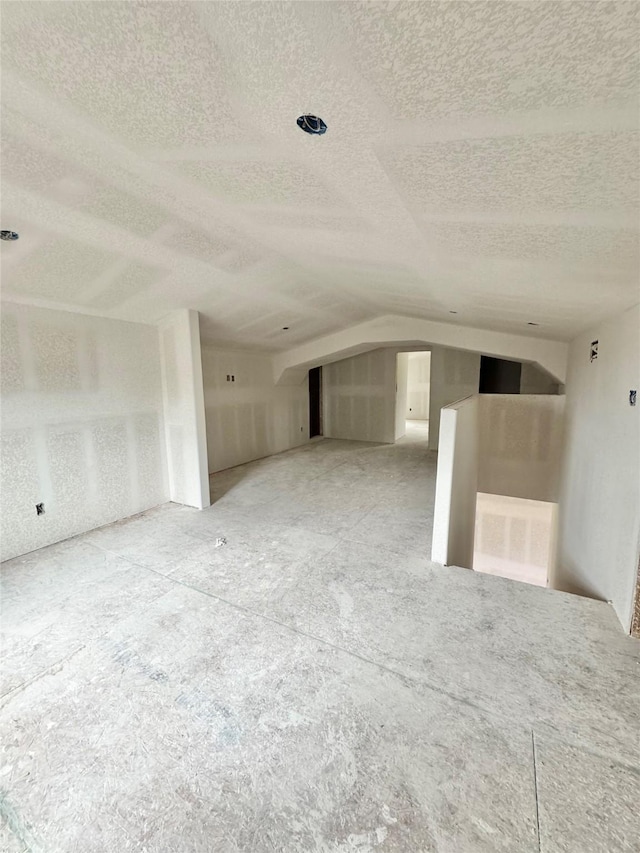 119 N 8th St, Beasley, TX 77417 - additional living space with a textured ceiling and lofted ceiling