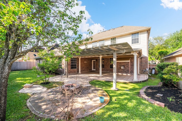 rear view of property featuring a pergola, a fenced backyard, brick siding, a patio area, and a lawn