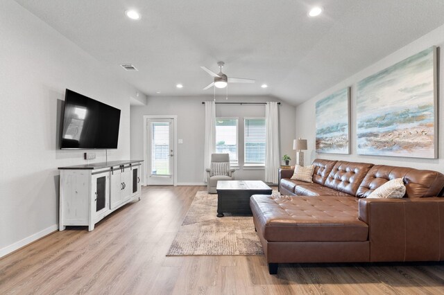 living area featuring recessed lighting, baseboards, ceiling fan, and light wood-type flooring