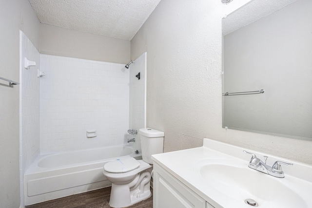 12719 Panay Dr, Houston, TX 77048 - full bathroom with vanity, toilet, a textured ceiling, wood finished floors, and  shower combination