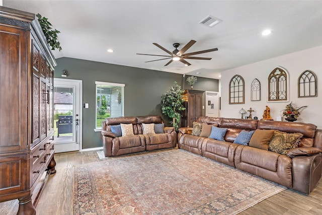 living area with recessed lighting, ceiling fan, visible vents, and light wood-type flooring