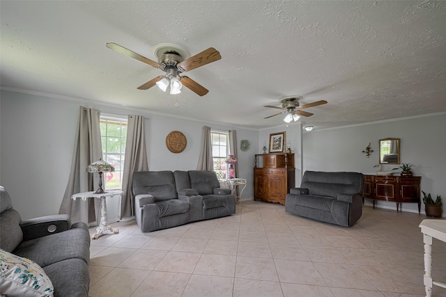 living area featuring crown molding, a textured ceiling, ceiling fan, and light tile patterned floors