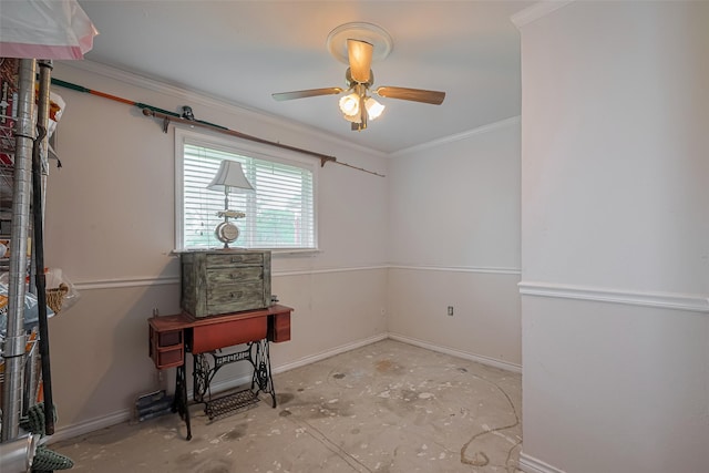 interior space with crown molding, baseboards, ceiling fan, and concrete flooring