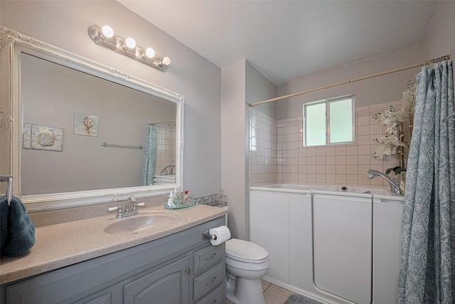 full bath with vanity and toilet