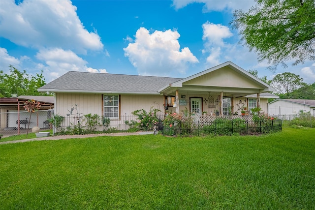 ranch-style house with a porch, fence private yard, and a front yard