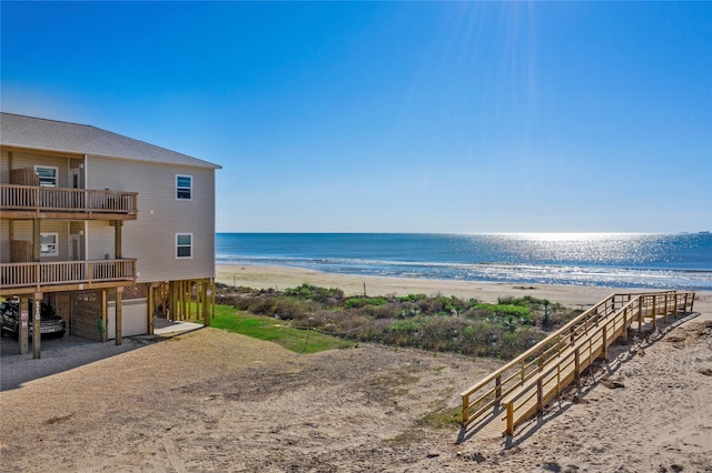 property view of water featuring a beach view