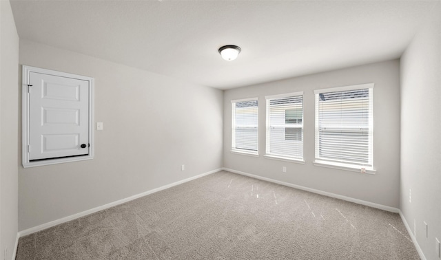 2617 Bisbee Rd, League City, TX 77573 - spare room featuring light colored carpet and baseboards