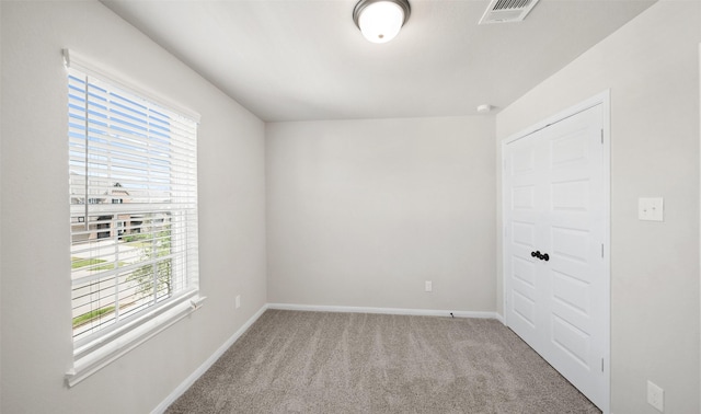 2617 Bisbee Rd, League City, TX 77573 - carpeted spare room featuring plenty of natural light and baseboards