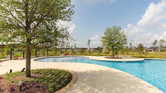 12944 Whitewater Way, Conroe, TX 77302 - outdoor pool featuring a patio area