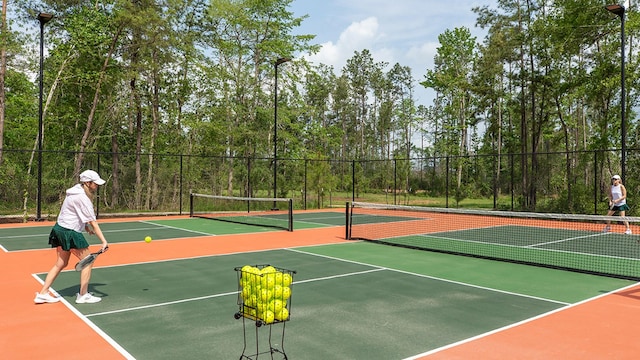 12944 Whitewater Way, Conroe, TX 77302 - view of tennis court with community basketball court
