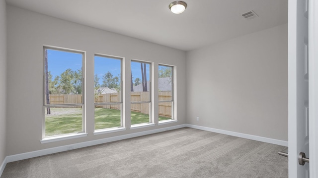 12944 Whitewater Way, Conroe, TX 77302 - carpeted empty room featuring baseboards