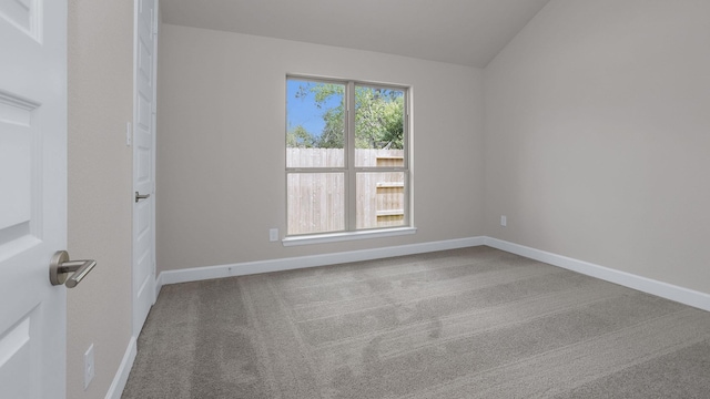 12944 Whitewater Way, Conroe, TX 77302 - carpeted spare room with baseboards and lofted ceiling