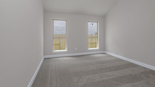 12944 Whitewater Way, Conroe, TX 77302 - carpeted empty room with lofted ceiling and baseboards