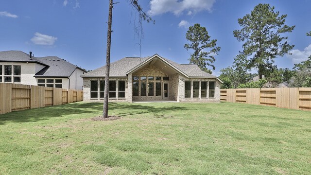12944 Whitewater Way, Conroe, TX 77302 - back of property with a fenced backyard and brick siding