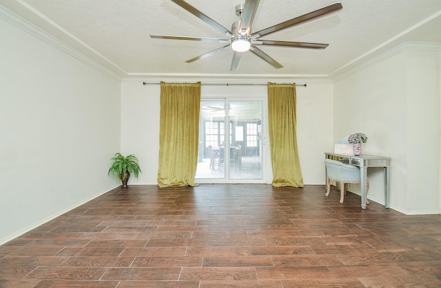 empty room with crown molding, ceiling fan, and wood finished floors