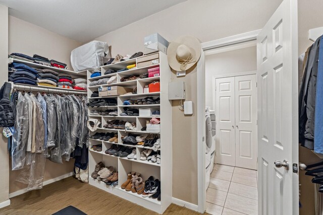 spacious closet featuring wood finished floors