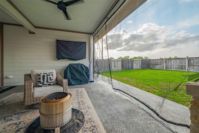 view of patio featuring a fenced backyard, a ceiling fan, and area for grilling