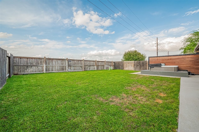view of yard featuring a fenced backyard