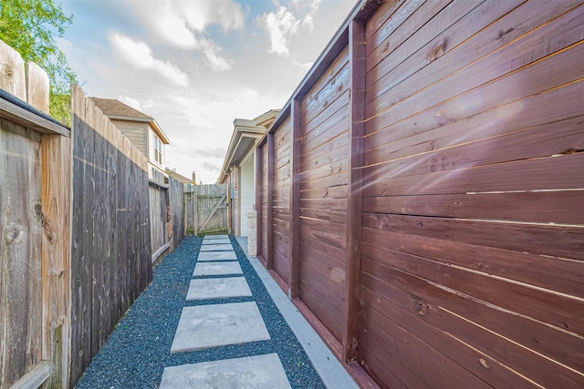 view of home's exterior featuring fence