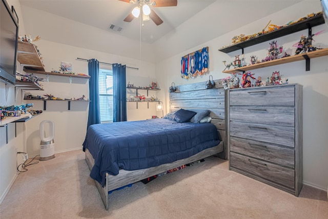 carpeted bedroom featuring a ceiling fan, baseboards, and visible vents