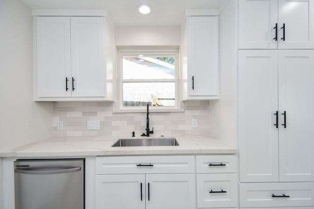 bar featuring a sink, backsplash, and dishwasher