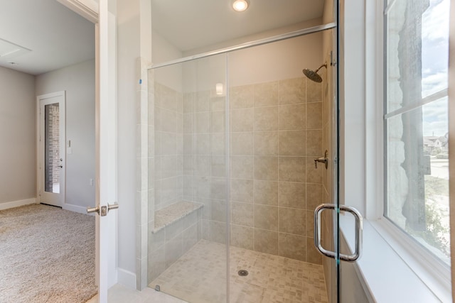 full bathroom with baseboards, a shower stall, and recessed lighting