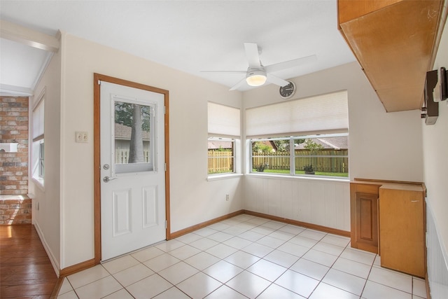 711 Rosewood Dr, Shenandoah, TX 77381 - foyer featuring plenty of natural light, a ceiling fan, and baseboards