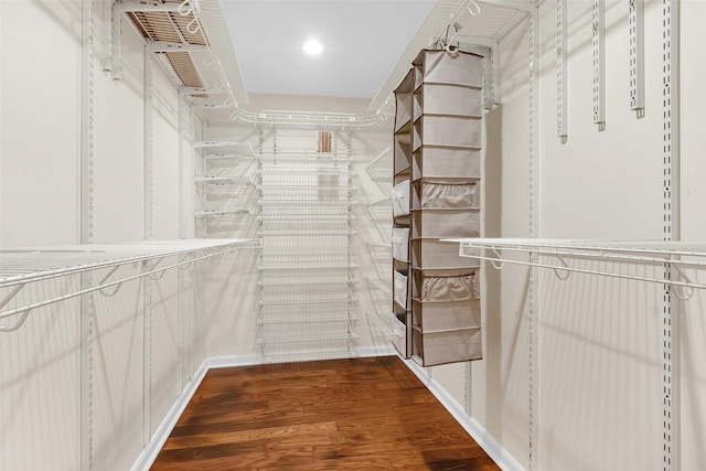 711 Rosewood Dr, Shenandoah, TX 77381 - walk in closet featuring dark wood-style floors