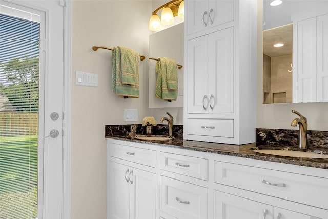 711 Rosewood Dr, Shenandoah, TX 77381 - bathroom featuring double vanity