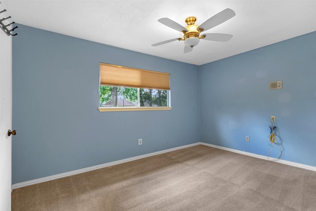 711 Rosewood Dr, Shenandoah, TX 77381 - empty room with carpet, a ceiling fan, and baseboards