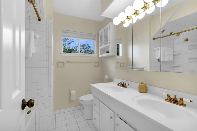 711 Rosewood Dr, Shenandoah, TX 77381 - bathroom with toilet, tile patterned floors, double vanity, and a shower