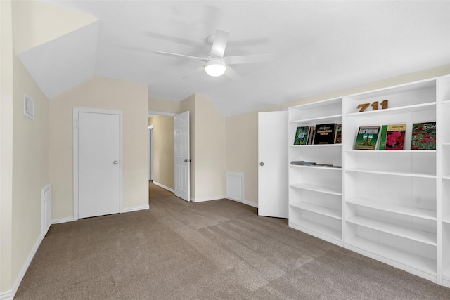 711 Rosewood Dr, Shenandoah, TX 77381 - additional living space with carpet, lofted ceiling, a ceiling fan, and baseboards