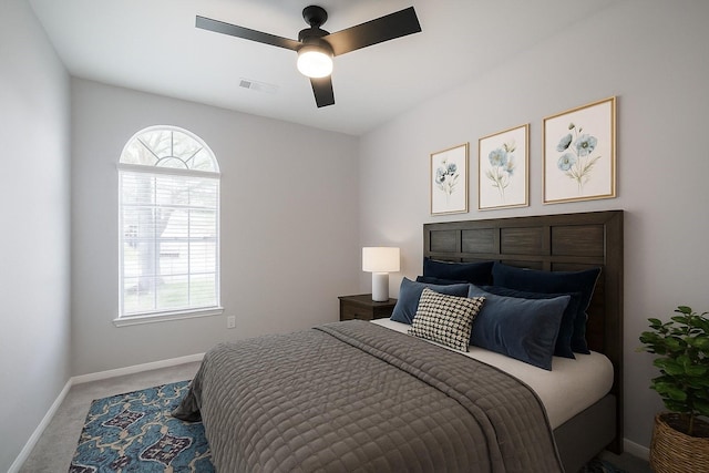 14810 Cascade Bend Ln, Cypress, TX 77429 - carpeted bedroom with multiple windows and a ceiling fan