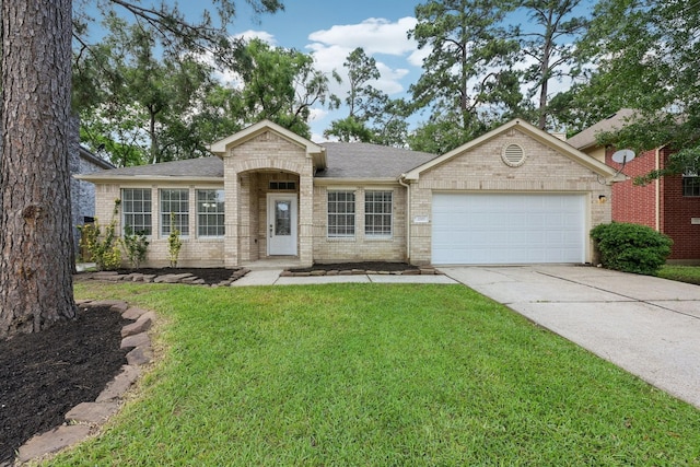 2707 Shawna Lyn Dr, Spring, TX 77373 - ranch-style house with a garage, a front lawn, brick siding, a shingled roof, and driveway