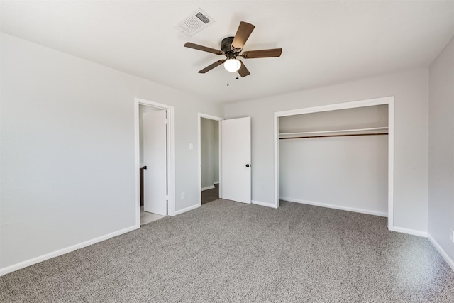 unfurnished bedroom with visible vents, carpet floors, a closet, baseboards, and ceiling fan