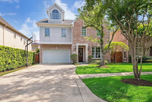 traditional home featuring driveway, a garage, brick siding, fence, and a front lawn