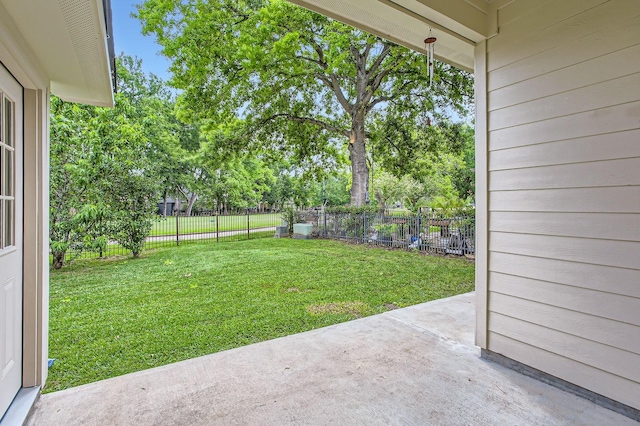 view of yard featuring a patio area and fence